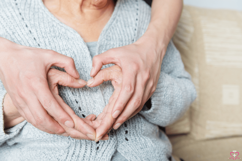 Hands of a caregiver gently holding the hands of an elderly person, Respite care and support.