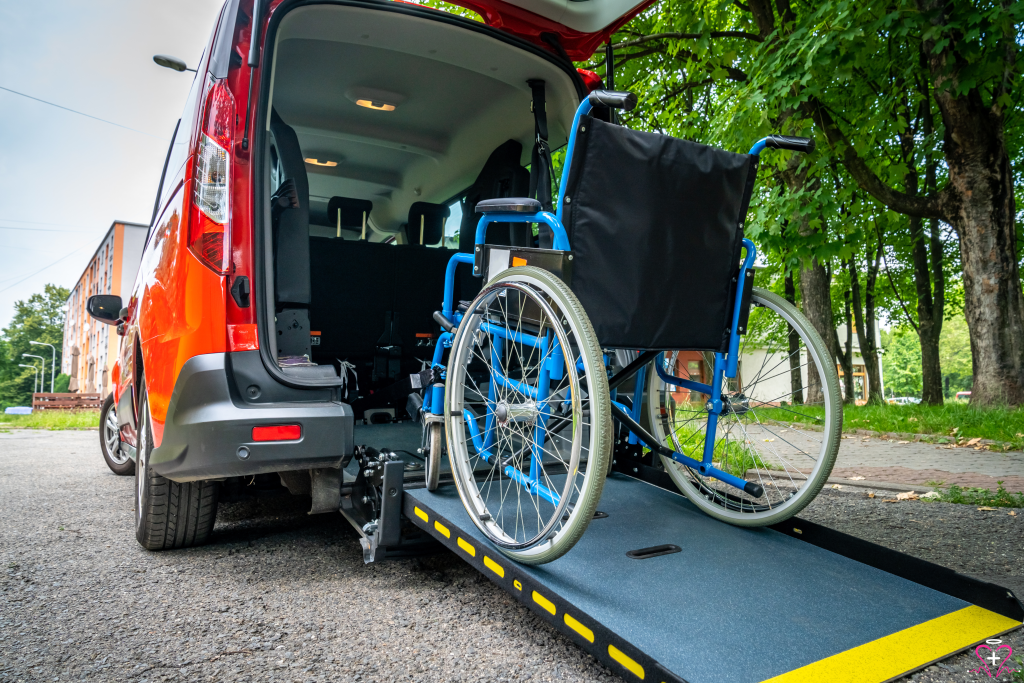 Non-Emergency Medical Transportation - A wheelchair positioned on a ramp leading into a van, showcasing non-emergency medical transportation.