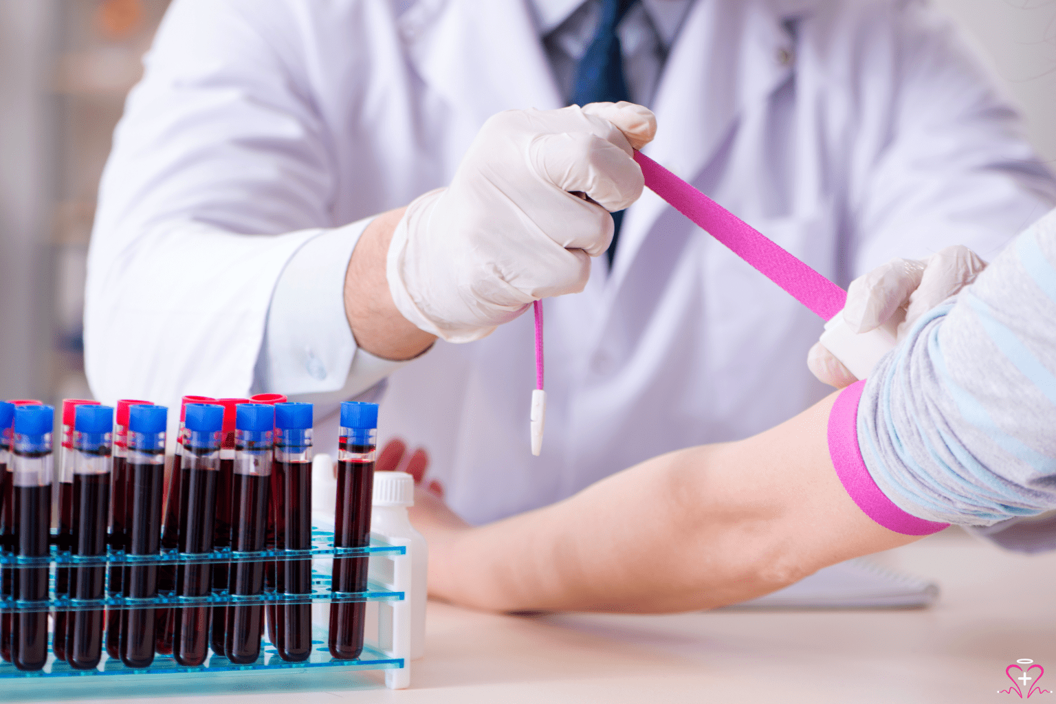 Essential Blood Tests for Women's Health - Doctor preparing to draw blood from a patient for women's health tests