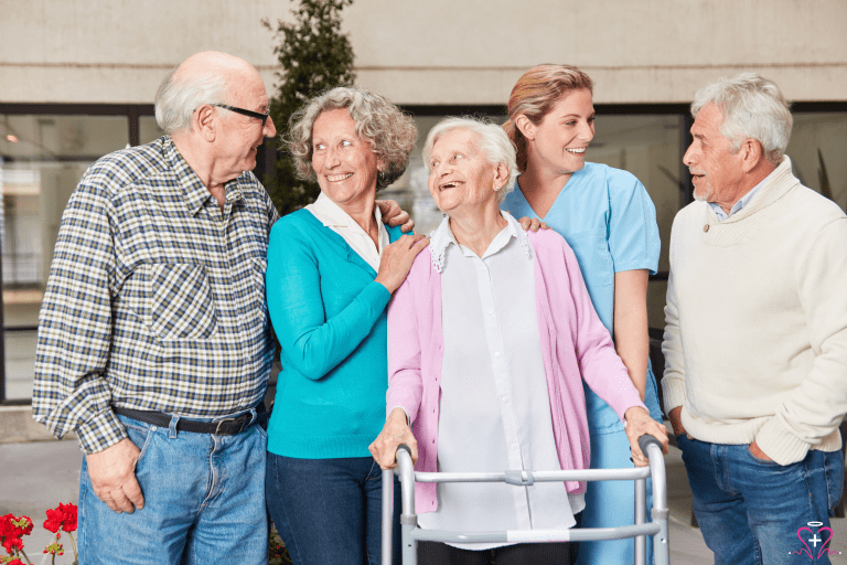 Happy seniors with a nurse.