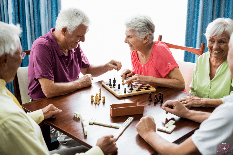 Seniors playing chess at an All Seniors Foundation event.