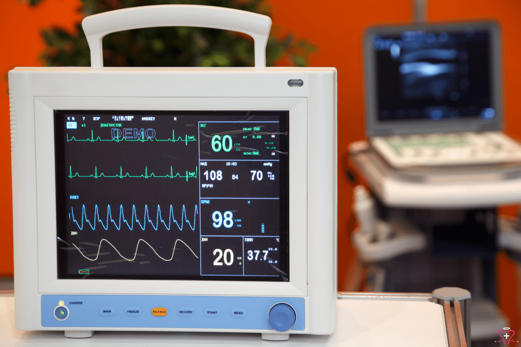 Medical monitor displaying capnography and pulse oximetry readings.