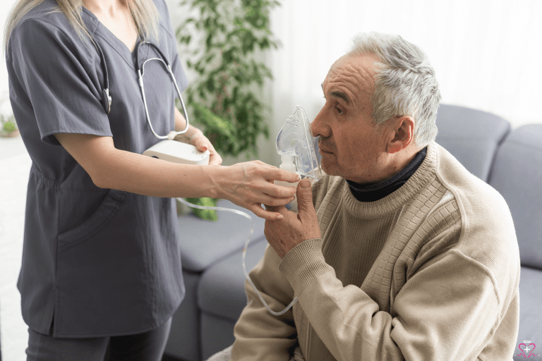 Elderly man using a home oxygen concentrator with the help of a healthcare professional.