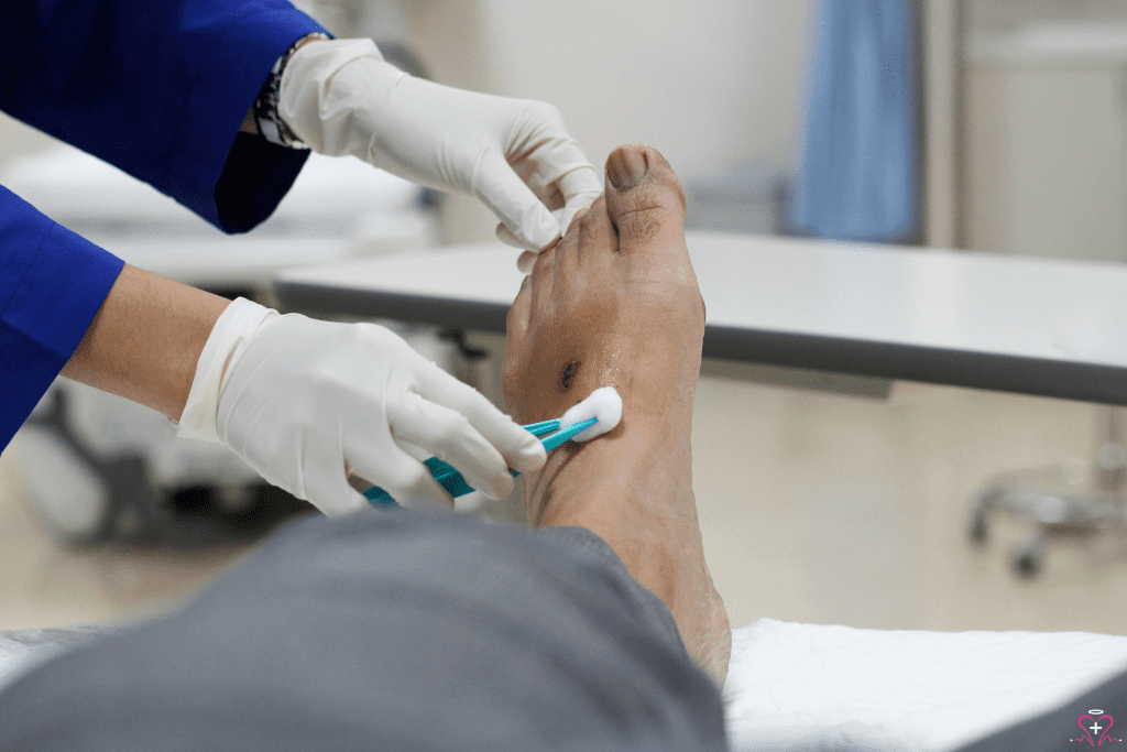 Healthcare professional providing foot care to a patient.