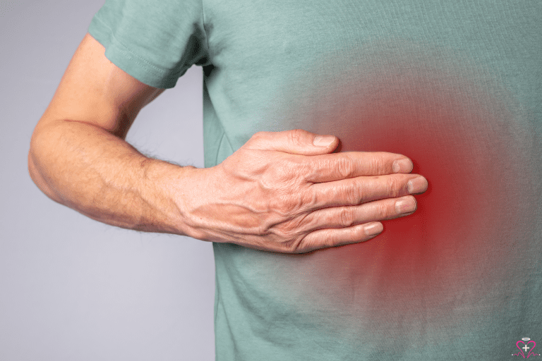 How Liver Specialists Can Help You - Person holding their abdomen, highlighting liver pain