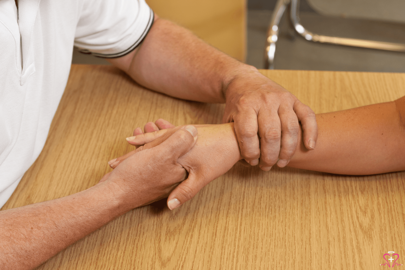 Occupational therapist assisting a patient with hand exercises