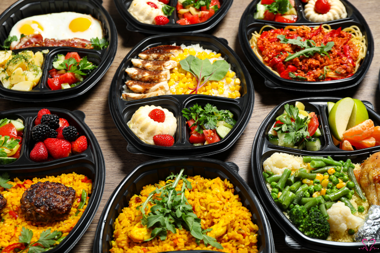 Free Meal Delivery Services for Seniors - Assorted healthy meals in black containers for seniors