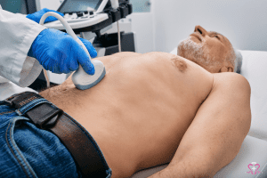 Ultrasound scans: How do they work? - A medical technician performing an ultrasound scan on a patient's abdomen.