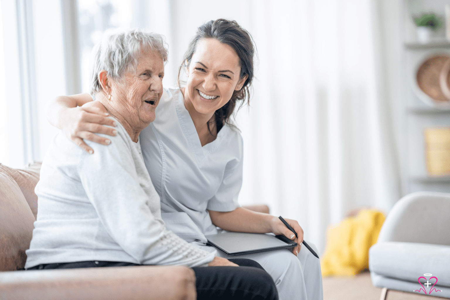 What is Protective Supervision? - Smiling nurse hugging a happy senior woman, both sitting on a couch.