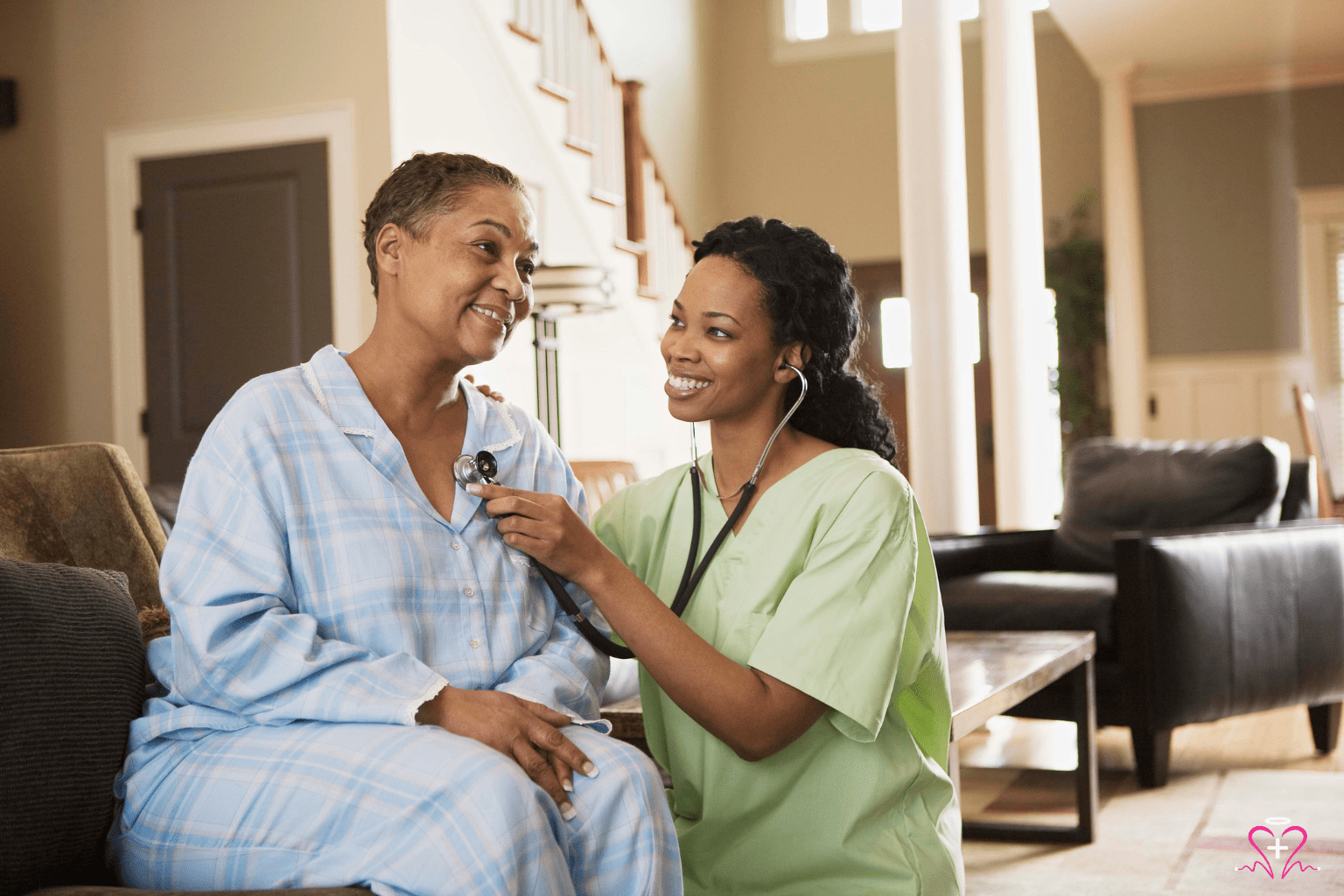 At-Home Diagnostic Imaging -Nurse conducting a medical check-up with a patient at home