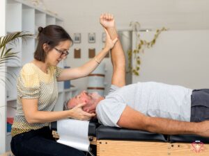 Chiropractor assisting a senior man with gentle neck and shoulder adjustments, representing personal injury chiropractic services for seniors.