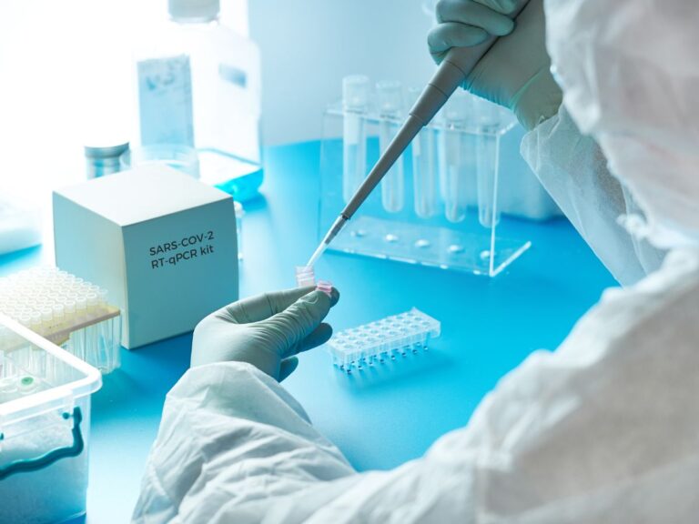 Senior wound-care professional using PCR testing kit to identify infection-causing pathogens in a wound — All Seniors Foundation