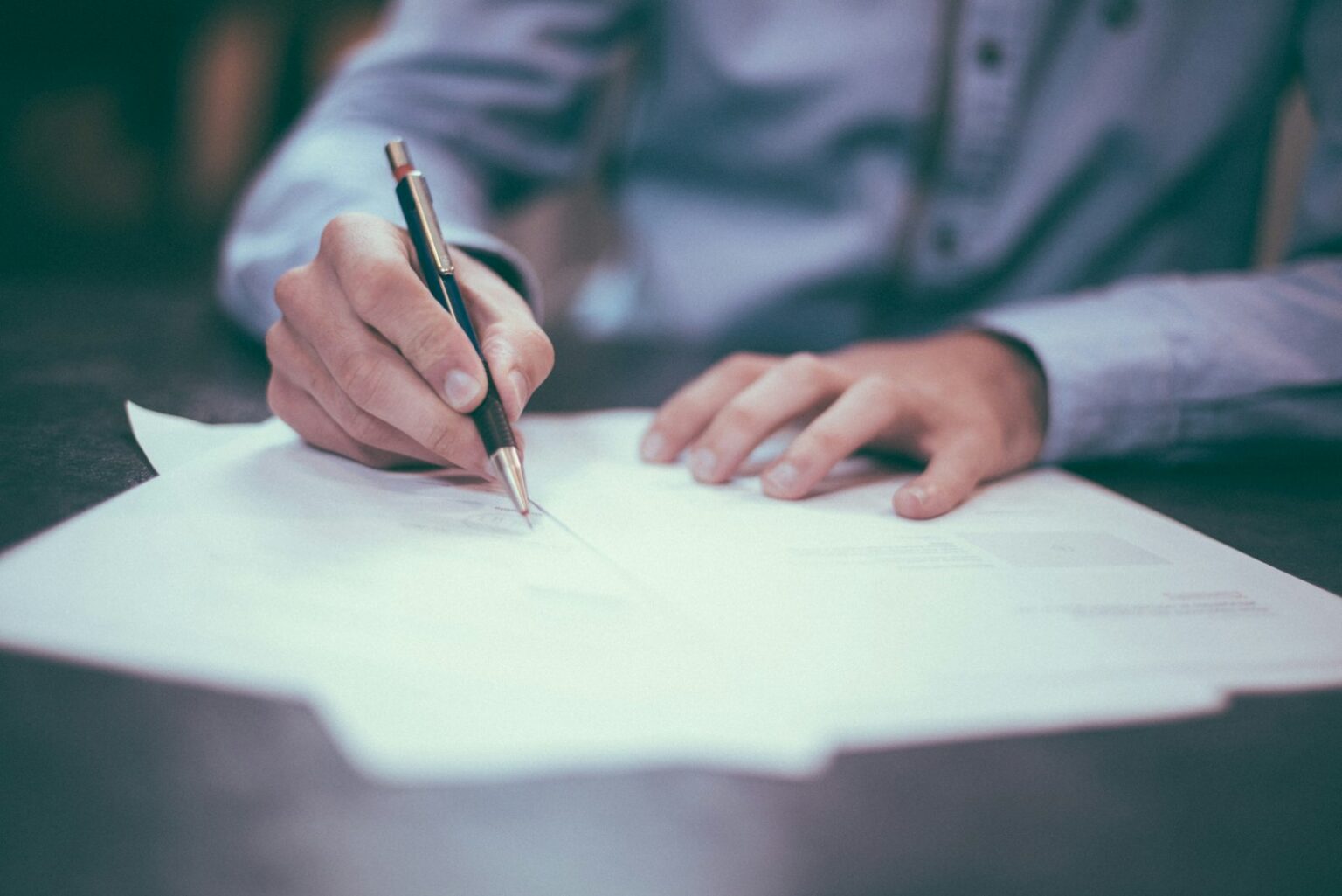 Senior reviewing Medi-Cal documents, illustrating Medi-Cal changes for seniors in 2026