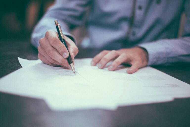 Senior reviewing Medi-Cal documents, illustrating Medi-Cal changes for seniors in 2026