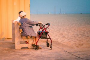 Senior woman wearing a sun hat outdoors, illustrating heat safety for seniors during a Los Angeles summer