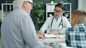 Senior with caregiver looking at paperwork, illustrating hidden senior benefits in Los Angeles
