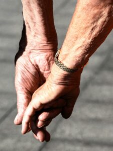 Senior reviewing legal documents, illustrating new senior care laws in California for 2026